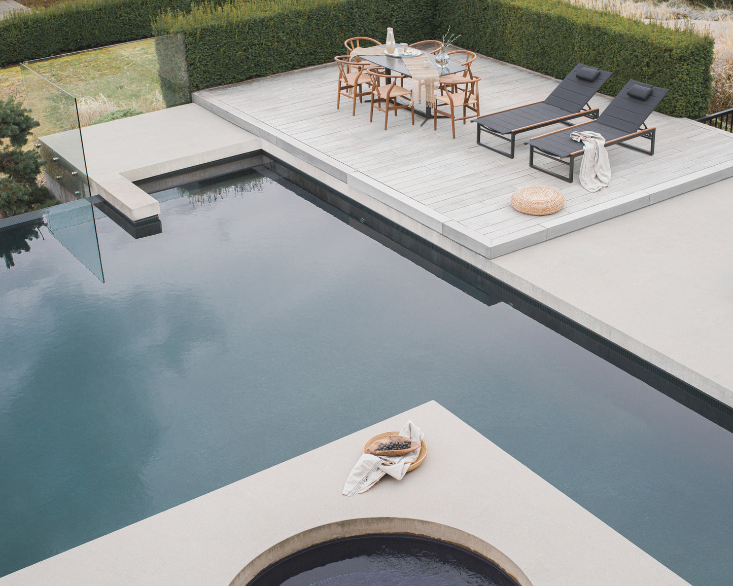 Outdoor Wishbone Chair featuring Elaine Dining Table in Black Marble